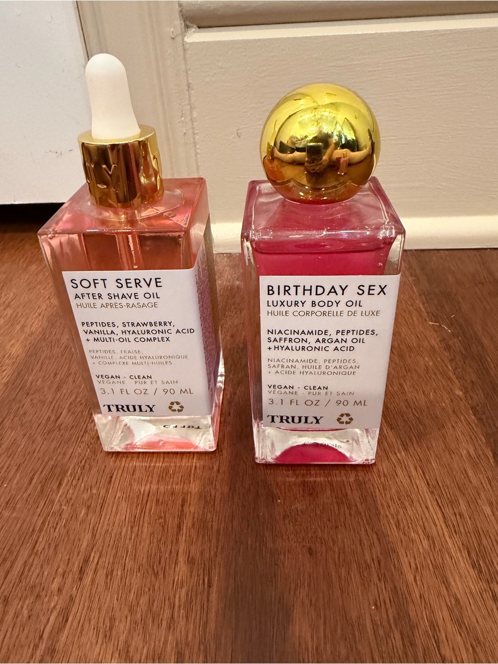 TRULY Luxury Body Oil Bottle in Pink and Gold